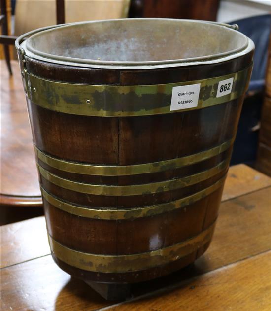 A brass bound mahogany peat bucket 35cm high